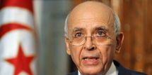Le premier ministre, Mohamed Ghannouchi, a détaillé le nouveau gouvernement tunisien, jeudi soir, à la télévision.AFP/FETHI BELAID