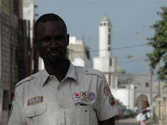 Birahim Ndiaye un émigré sénégalais qui importe d'Italie des pièces détachées pour véhicules. en Italie Laurent Correau/RFI