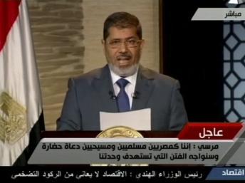 Mohamed Morsi lors de sa première allocution télévisée comme président élu, le 24 juin 2012. REUTERS/Egypt TV