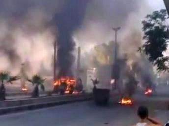 Des colonnes de fumées noires s'élèvant au-dessus de Damas, mercredi 18 juillet.