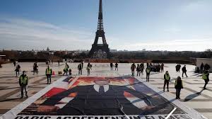 France: Emmanuel Macron, héritier contrarié de la COP21