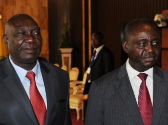 François Bozizé (à droite) et Michel Djotodia, le 11 janvier 2013 à Libreville, au Gabon. AFP PHOTO / STEVE JORDAN