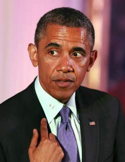 Du rouge à lèvres sur le col de sa chemise: Obama s'explique