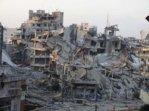 Un quartier de Homs, déserté, et complètement détruit par les bombardements de l'armée syrienne, le 13 juillet 2013. REUTERS/Yazan Homsy
