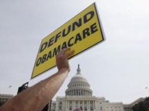 Des manifestants du Tea Party, le 10 septembre dernier, manifestant contre la réforme phare de Barack Obama sur la santé, dite «Obamacare», à Washington. REUTERS/Jonathan Ernst