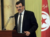 Le Premier ministre tunisien Ali Larayedh s'est engagé sur « le principe » d'une démission du gouvernement. AFP PHOTO / FETHI BELAID