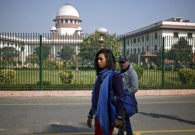 Liberation.fr/Libération.fr - Des défenseurs des droits homosexuels se rendent à la Cour suprême d'Inde, à New Delhi le 11 décembre.
