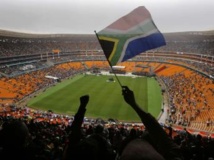 Le stade Soccer City au début de l'hommage à Nelson Mandela, le 10 décembre 2013. REUTERS/Yannis Behrakis