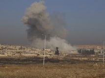 Nuage de fumée résultant de l'explosion d'une bombe non loin d'Alep, le 21 décembre 2013. REUTERS/Ahmad Othman