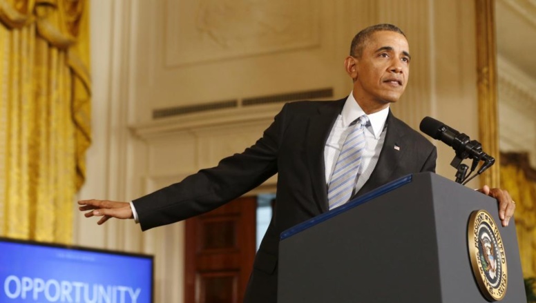 Barack Obama s'exprime sur son choix d'augmenter le salaire minimum des travailleurs sous contrat fédéral à la Maison Blanche à Washington, le 12 Février 2014
