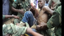 Plusieurs miliciens de Morgan visiblement blessés à l'arrière d'un pick-up de l'armée, le 14 avril dernier, jour de la mort de leur chef. Photo exclusive transmise à RFI et France 24.