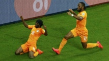 Les Ivoiriens Gervinho (à gauche) et Didier Drogba. REUTERS/Ruben Sprich Les Ivoiriens Gervinho (à gauche) et Didier Drogba. REUTERS/Ruben Sprich