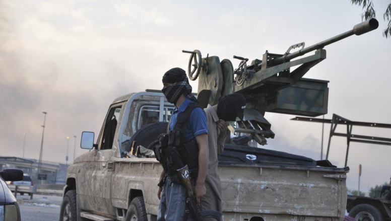 Combattants de l'Etat islamique à Mossoul, le mercredi 11 juin 2014. REUTERS/Stringer