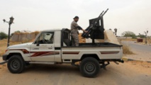 © Mahmud Turkia, AFP | Les stigmates des combats entre milices rivales à Tripoli (Archives)
