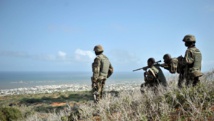 Des soldats de l'Amisom au-dessus de Barawe, le 5 octobre 2014. AFP PHOTO/AMISOM/TOBIN JONES Des soldats de l'Amisom au-dessus de Barawe, le 5 octobre 2014. AFP PHOTO/AMISOM/TOBIN JONES