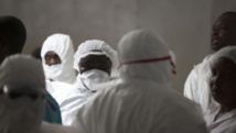 Des personnels soignants à Monrovia, le 30 septembre 2014. REUTERS/Christopher Black/WHO/Handout via Reuters
