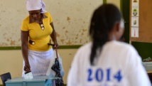 Opérations de vote à Gaborone, le 24 octobre 2014. AFP PHOTO/MONIRUL BHUIYAN