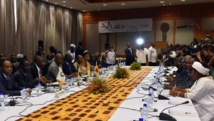 Les trois chefs d'Etat de la Cédéao et les différents acteurs burkinabè sont parvenus à trouver un accord pour une transition, mercredi 5 novembre. AFP PHOTO / ISSOUF SANOGO