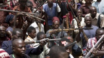 Des habitants de l’Etat de Borno, au Nigeria, regroupés en milice d’auto-défense pour lutter contre la menace de Boko Haram, le 5 juin 2014.