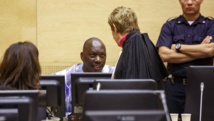 Thomas Lubanga lors de son premier jugement en appel à La Haye où la Cour pénale internationale a confirmé sa peine de 14 ans de prison, ce lundi 1er décembre 2014. REUTERS/Michael Kooren