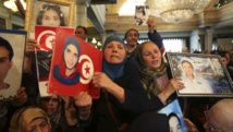 Les proches des victimes de la révolution tunisienne de 2011 lors des célébrations du 4e anniversaire, le 14 janvier 2015, au palais présidentiel. REUTERS/Zoubeir Souissi