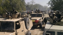Des éléments de l'armée tchadienne dans les rues de Gambaru, au Nigeria, le 4 février 2015. REUTERS/Stringer