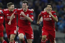 Carragher veut que Suarez revienne