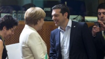 Tsipras, Merkel et Hollande font le point en marge du sommet UE-CELAC Tsipras, Merkel et Hollande font le point en marge du sommet UE-CELAC