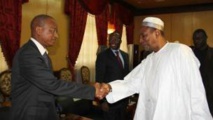 Le Président guinéen Alpha Condé et le chef de l'opposition Cellou Dalein Diallo