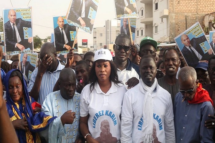 ​Les mouvements de soutien à Karim Wade comptent réserver un accueil particulier à Emmanuel Macron