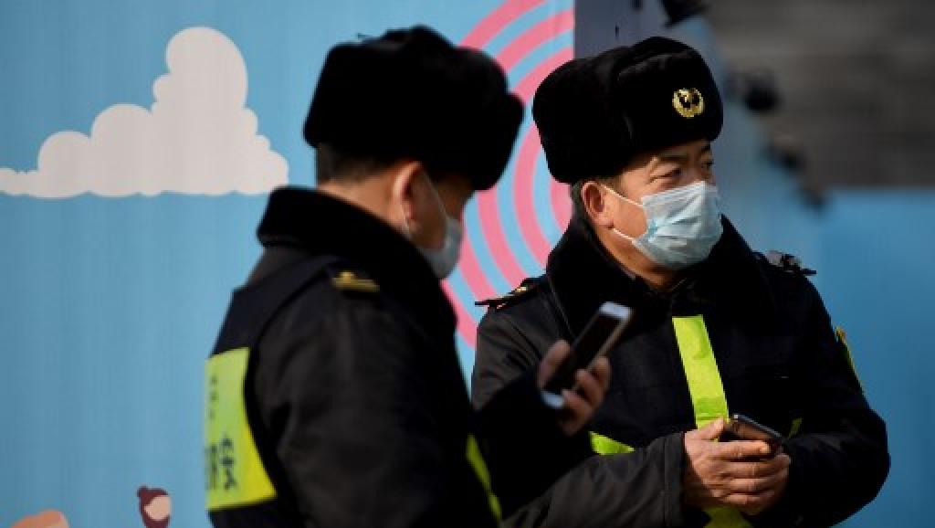 Coronavirus: la Chine confine des villes et ferme la Cité interdite