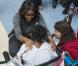 Michelle Obama : Charmante conteuse de Noël au milieu d'enfants enchantés