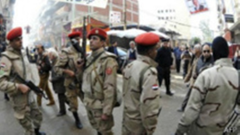 Des membres des forces armées égyptiennes déployés dans les villes lors des dernières élections, au mois de janvier.