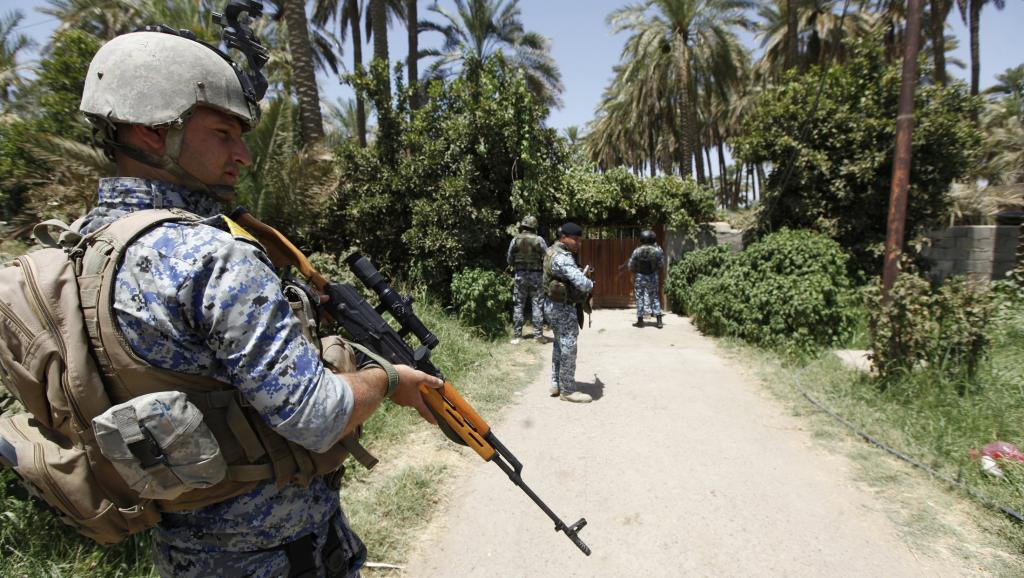 Patrouille des forces spéciales de la police irakienne au nord de Bagdad, le 30 juin 2014. REUTERS/Ahmed Saad