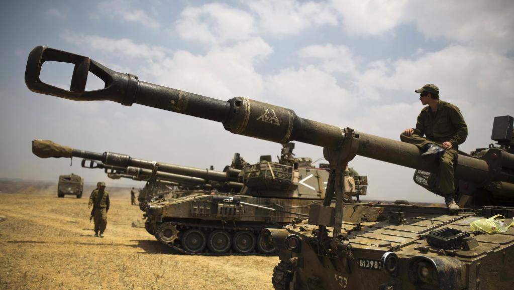 Des soldats israéliens positionnées près de la bande de Gaza, le 22 juillet 2014. REUTERS/Amir Cohen