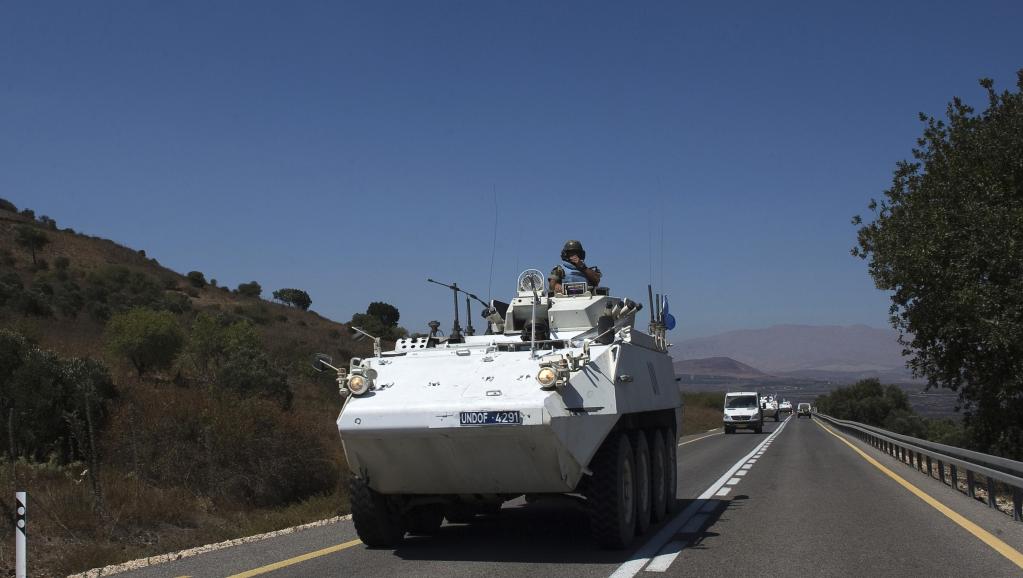 Ces casques bleus appartiennent à l'Undof, la Force de l'ONU chargée de l'observation du désengagement entre la Syrie et Israël sur le plateau du Golan. REUTERS/Ronen Zvulun