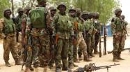 Des soldats nigérians dans le village de Baga, à la sortie de Maiduguri, dans la province de Borno, le 13 mai 2013.