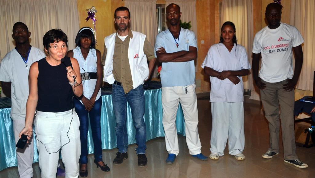 Annick Girardin au centre d'isolement de Médecins sans frontières à l'hôpital Donka de Conakry, le 13 septembre 2014. AFP PHOTO / CELLOU BINANI