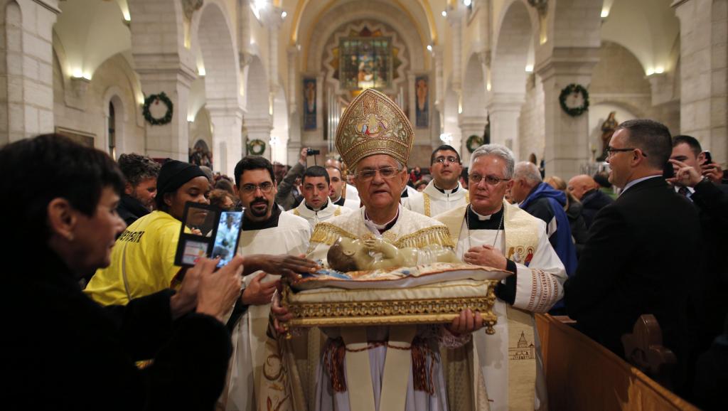 Le patriarche latin de Jérusalem Mgr Fouad Twal, a réclamé la paix au Proche-Orient, 24 décembre 2014, Bethléem. REUTERS/Ammar Awa