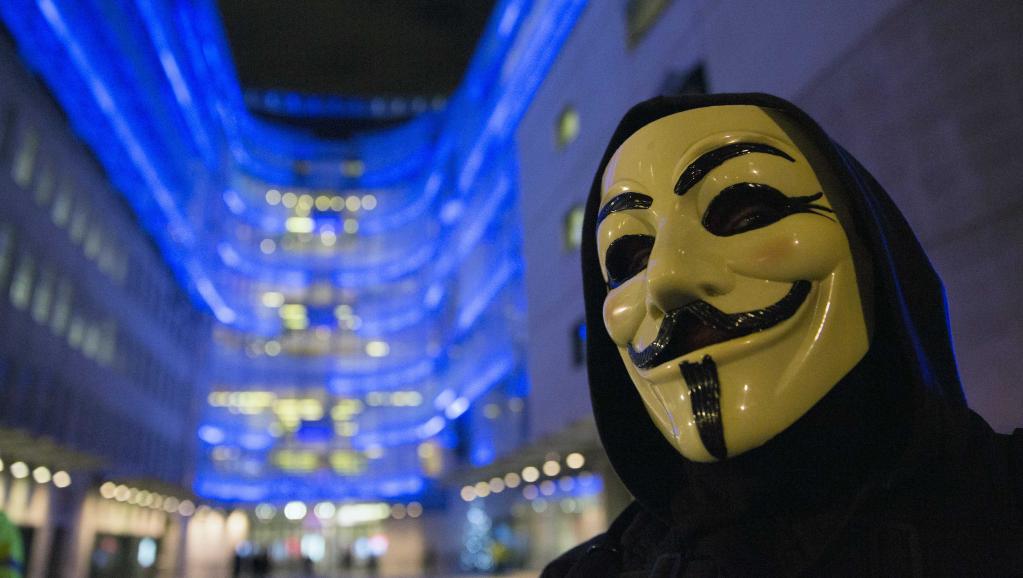 Un partisan du groupe Anonymous, le 23 décembre 2014 à Londres. REUTERS/Neil Hall