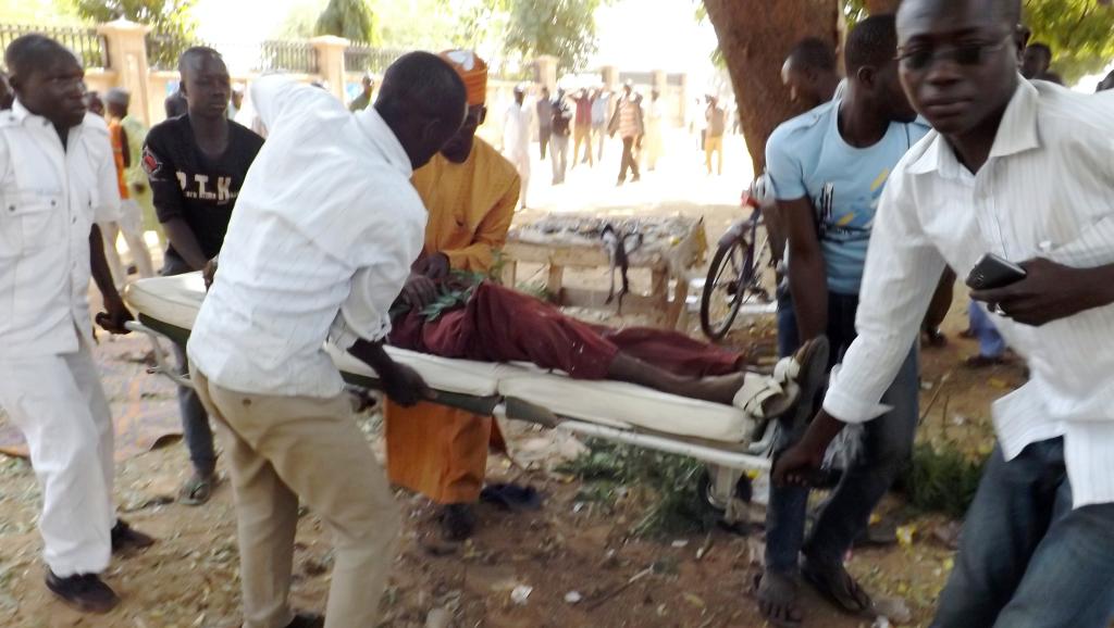 au moins sept personnes ont été tuées dimanche par un attentat-suicide visant une réunion au domicile d'un homme politique à Potiskum, le 1er février 2015. AFP PHOTO / AMINU ABUBAKAR