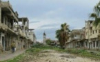 ​Des rebelles remettent leurs armes dans le centre de la Syrie