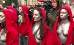 Gilets Jaunes : seins nus, des femmes habillées en Marianne font face aux CRS