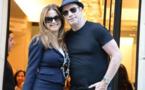 John Travolta très gai à Paris aux côtés de ... sa femme!