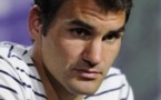 Wimbledon: après sa défaire, Federer dit "ne pas paniquer"